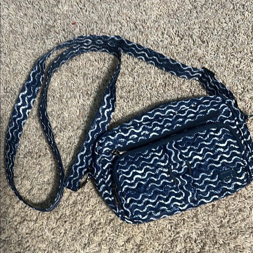 Lug Carousel convertible bag NWOT. Crossbody, belt or sling bag - it does all!